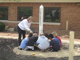 Planting around the Peace Pole - online jigsaw puzzle - 35 pieces
